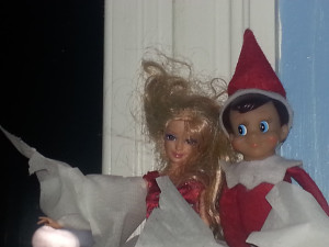 Alvin the Elf on the Shelf and Barbie making mischief.